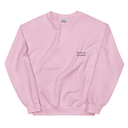 Cozy Femileganz sweater with minimalist lettering designs