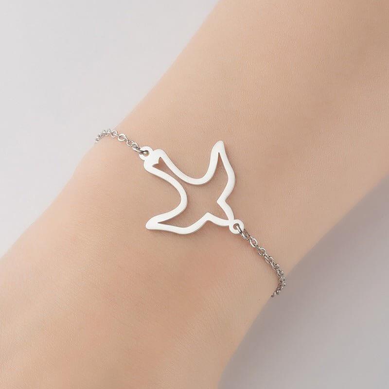 Feines Armband aus Edelstahl mit schlichtem Vogel-Anhänger in Silber. Ideal für einen minimalistischen und eleganten Stil.